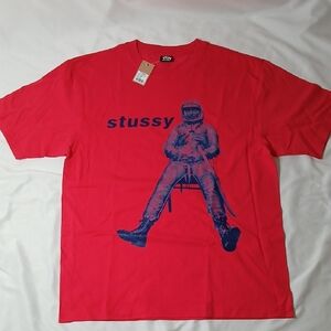 Stussy Red Tee with Navy Astronaut Graphic